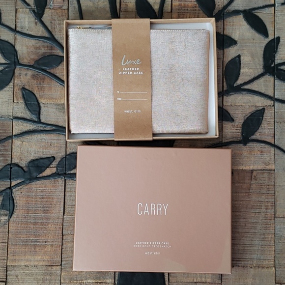 West Elm Handbags - West Elm Carry Lux Leather Zipper case Rose gold